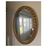 Ornate Oval Wall Mirror with a Molded Resin 25"