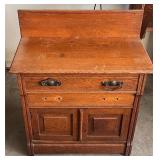 Antique Victorian-era oak washstand