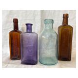 Variety of 4 Different Shaped Glass Bottles