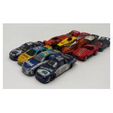 Variety of HotWheels And Other Racing Cars