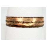Gold-tone (possibly brass) Wedding band