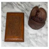 Leather cup holder and carved wooden picture