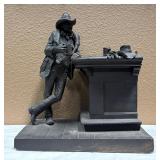 Cowboy at The Saloon Sculpture