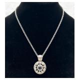 Interesting Metal Pendant on a Chain