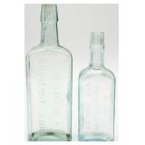 2 ANTQ Glass Bottles