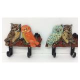 Two plastic owl hangers
