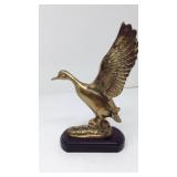 Brass duck statuette