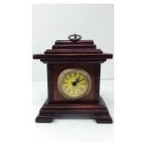 Wooden clock with compartment