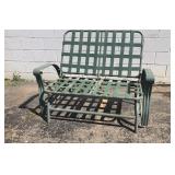 Green metal glider bench