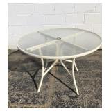 White glass top patio table