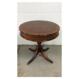 Round leather top table with drawers