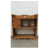 Wooden cabinet with heart cut out