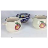 Set of three floral pottery pieces