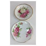 Two matching small China plates