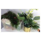 Box of artificial plants, towels, Christmas items