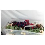 Box of artificial flowers with container