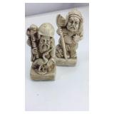 Pair of two resin statuettes "Safety" "Science"