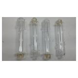 Set of four blown glass candle sticks
