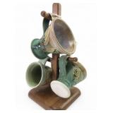 Deb LaPlante Pottery Mugs on Wooden Tree