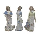 Trio of Hand-Painted Porcelain Lady Figurines