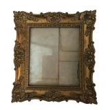 A Cameo Creation Gilt Cast Metal Picture Frame