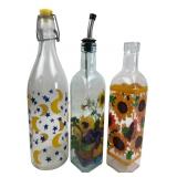 Set of Three Decorative Glass Bottles