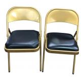 Pair of Gold Metal Folding Chairs Black Vinyl Seat