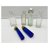 Six Vintage Bottles
