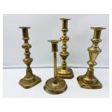 Four Antique Brass Candlesticks
