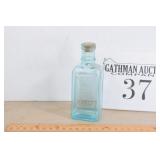 Rem-Oil Glass Bottle