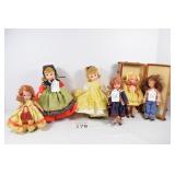 (5) Assorted Dolls & Suitcase