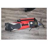 Set of Golf Clubs in Red Caddy