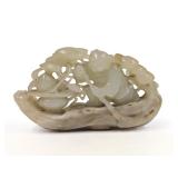 Celadon Jade Carving of a Boy with Peaches. Celadon Jade Carving of a Boy with Peaches.