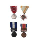 Group of 4 Japanese Merit Medals. Group of 4 Japanese Merit Medals.