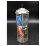 Barbicide disinfectant jar