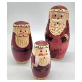 Vintage wooden nesting Santas