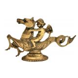 Vintage brass cherub riding dragon