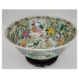 Chinese porcelain bowl on a wooden stand