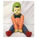 Hand carved wooden Asian boy