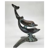 Antiqued brass dolphins