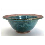 Unique pottery bowl signed