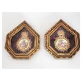 Pair Romm NY wall plaques behind glass