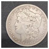 1881 Morgan silver dollar