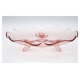 Footed pink depression glass dish