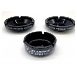 Vimtage black glass Las Vegas hotel ashtrays