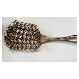 Antique iron pot scrubber