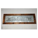 Punched tin welcome sign