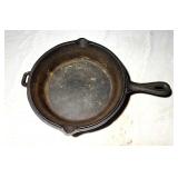 Heavy cast iron frying pan