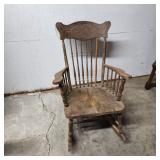 Antique pressed back rocking chair