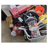 pile of janitorial items, backpack vac, and more